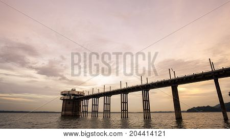 The long bridge on reservoir Chonburi Thailand.