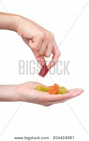 Various Color Of Fruity Gummy Jelly Candies In Hand Isolated On White Background