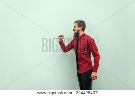 Shout Messege. Megaphone. Anger Bearded Businessman Shout.