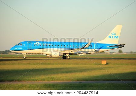 Amsterdam the Netherlands - June 2nd 2017: PH-EXL KLM Cityhopper Embraer ERJ-175 taking off from Polderbaan Runway Amsterdam Airport Schiphol