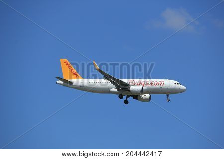 Amsterdam the Netherlands - July 9th 2017: TC-DCA Pegasus Airbus A320-200 approaching Schiphol Amsterdam Airport Kaagbaan runway
