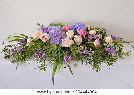 a tender wedding arrangement of fresh flowers. for decorating a table or a wedding car