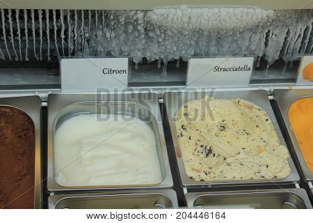 Assorted ice cream flavours on display in a shop