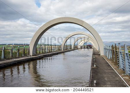 A Ferry Boat Approching Canal After Has Been Lifted In Falkirk Wheel