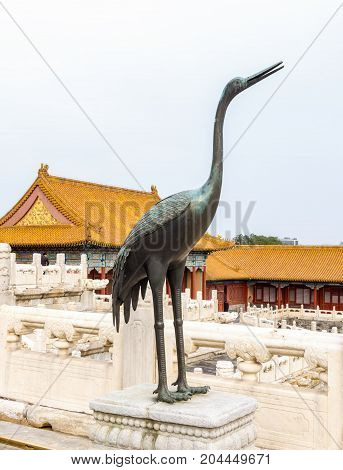 Beijing, China - Oct 30, 2016: Copper crane, one of a pair, at the Hall of Supreme Harmony (Taihedian), Forbidden City (Gu Gong, Palace Museum).