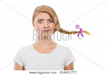 Teenage Girl In Braid Hair Making Funny Face