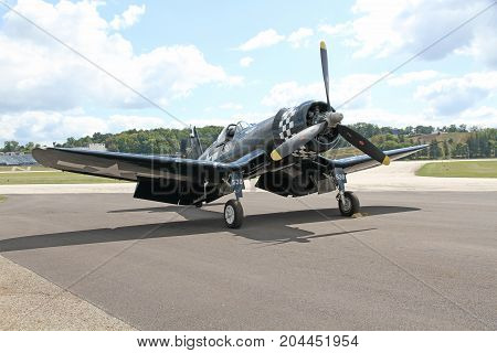 AKRON USA - SEPT 9: Goodyear FG-1D Corsair at Props and Pistons Airshow taking place at the Akron Fulton International Airport