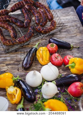 Clouse-up of vegetables and meat. Colorful table.