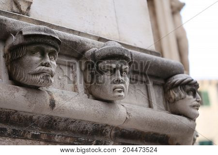 Sibenik cathedral / Famous faces on the side protal of Sibenik cathedral