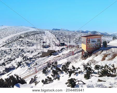 Borovets, Bulgaria - January 30, 2017: Panorama of winter mountains, ski slopes in bulgarian alpine ski resort Borovets