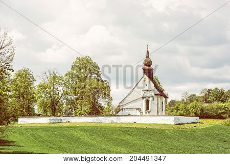 Chapel of Our Mother God near Veveri castle Moravia Czech republic. Religious architecture. Travel destination. Yellow photo filter.