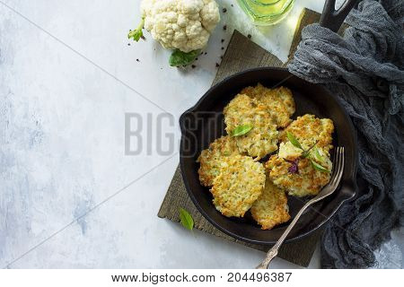 Vegetable Pancakes On Stone Or Slate Background. Fried Vegetarian Cutlets Or Pancakes. The Concept O
