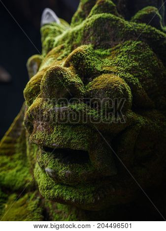 Rakasa Balinese Stone Sculpture Covered With Moss.