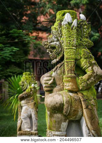 Rakasa Balinese Stone Sculpture Covered With Moss.