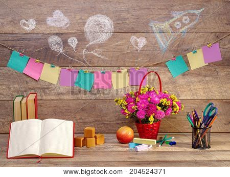 Back to school concepty with clear blackboard background, desk, items