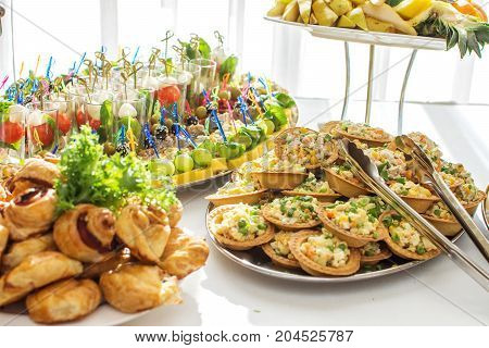 Delicacies and snacks at a buffet or Banquet. Catering. Selective focus.
