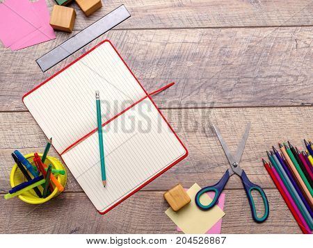 Back to school concepty with clear blackboard background, desk, items