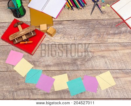 Back to school concepty with clear blackboard background, desk, items