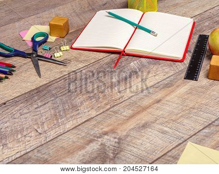Back to school concepty with clear blackboard background, desk, items