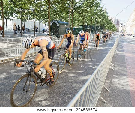 STOCKHOLM - AUG 26 2017: Jonathan Brownlee Justus Nieschlag and group of male triathlete cyclists in the Men's ITU World Triathlon series event August 26 2017 in Stockholm Sweden
