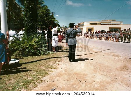 NUKU'ALOFA, TONGATAPU / TONGA - CIRCA 1990: High ranking soldiers salute a military parade during a national holiday.