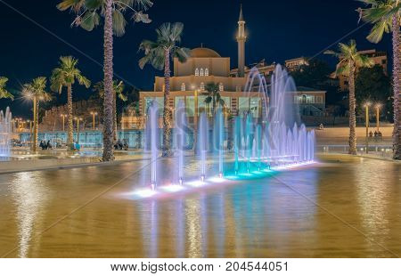 ALBANIA DURRES - September 22 2015: Main Mosque in Durres city - Albania. Evening view the mosque of Fatih with illumination and fountains