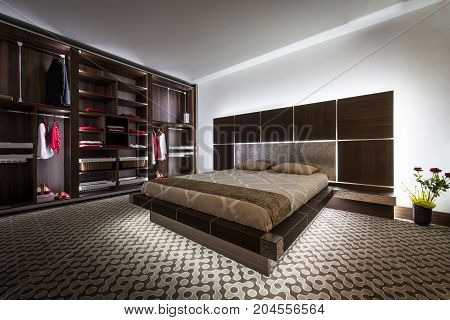 Comfortable Bed And Built In Closet In Bedroom