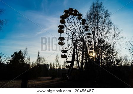 old broken Ferris wheel in Pripyat after accident
