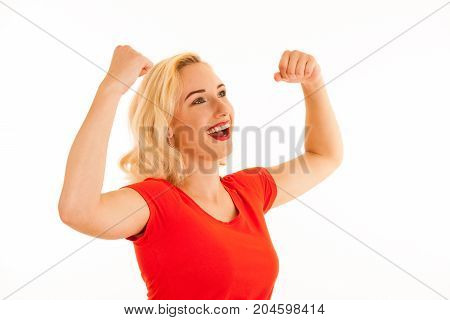 Attrctive Young Blonde Woman Gesture Success With Arms Up Isolated Over White Background