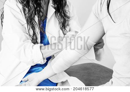 Compression Bandage To Inflammation, Application A Spiral Bandage. Application A Spiral Bandage In S