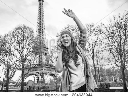 Young Woman Using A Mobile Phone And Handwaving