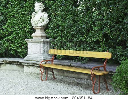 old European Italian park in Padua green wall bench sculpture
