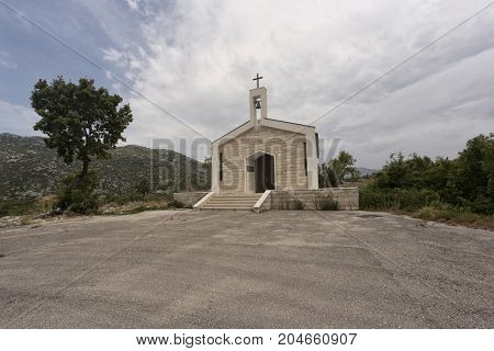 Nature landscape with nice church in a mountain pass