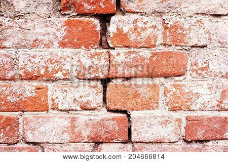 Old red bricks with concrete and crack. Orange