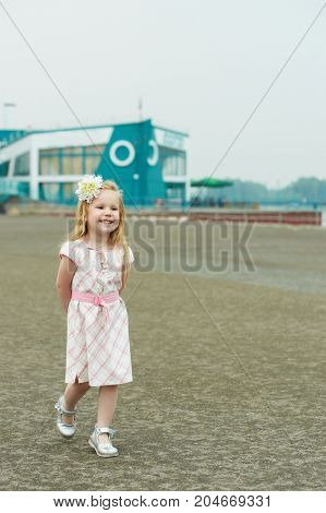 Girl in a dress. Summer walk outdoos