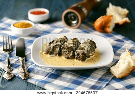 Hot fresh Georgin dolma on plate with sauce