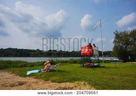 Life Guard By A Lake