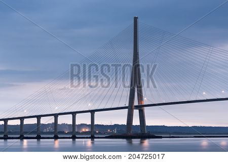 Sunrise view at Pont de Normandie bridge over river Seine between Le Havre and Honfleur in France