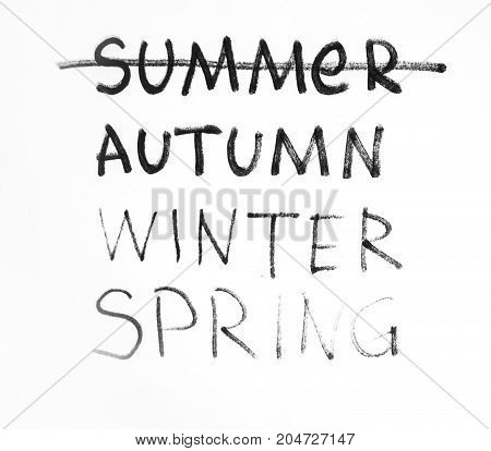 Season words list with summer strikeout. Autumn period of time on paper