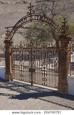 Tiliviche, Tarapaca Region, Chile - August 21, 2017: Historic British Cemetery from the era of nitrate mining in the Atacama Desert, in the grounds of Hacienda Tiliviche in northern Chile.