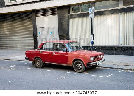 London, England, April 2017: Iconic Soviet Lada Zhiguli car parked on one of the street in central London Great Britain