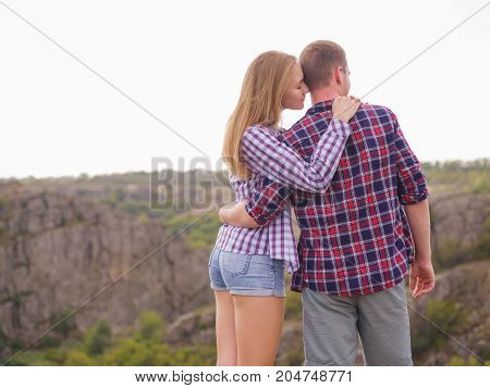 A young couple came to the mountains for a vacation. Healthy lifestyle.