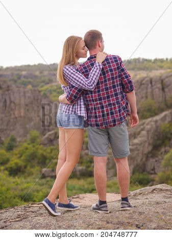 A young couple came to the mountains for a vacation. Healthy lifestyle.