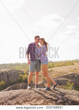 A young couple came to the mountains for a vacation. Healthy lifestyle.
