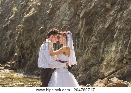 Romantic dating. Young loving couple embracing on nature.