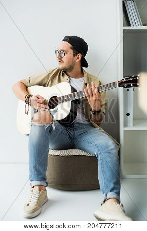 Man Playing Guitar