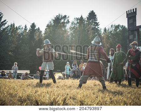 Moscow,russia-june 06,2016: Martial Duel Of Two Medieval Spearman Warriors. Opponents With Spear In