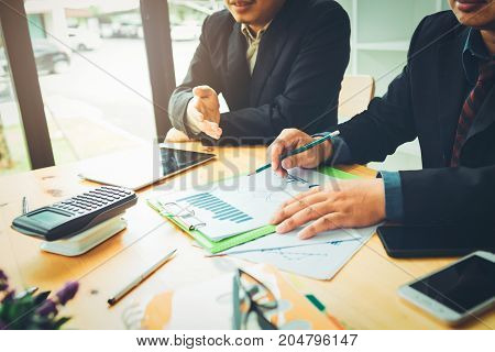 Co-workers are consultants on business documents, tax, transactions and business combinations after a bankrupt merger with a newly founded company.