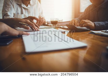 Co-workers are consultants on business documents tax transactions and business combinations after a bankrupt merger with a newly founded company.