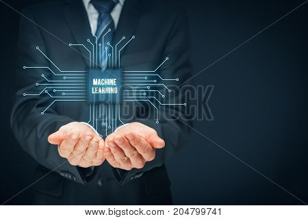 Machine learning data analysis concept. Businessman or programmer with abstract symbol of a chip with text machine learning connected with data represented by points.
